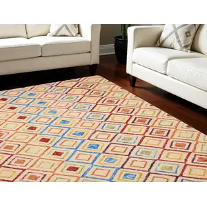 Photo of Ivory Blue And Red Wool Geometric Hand Tufted Area Rug