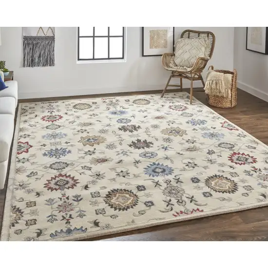 Ivory Blue And Tan Wool Floral Tufted Handmade Stain Resistant Area Rug Photo 9