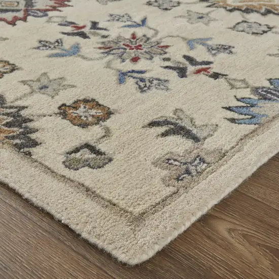 Ivory Blue And Tan Wool Floral Tufted Handmade Stain Resistant Area Rug Photo 3