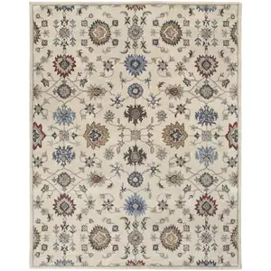 Photo of Ivory Blue And Tan Wool Floral Tufted Handmade Stain Resistant Area Rug