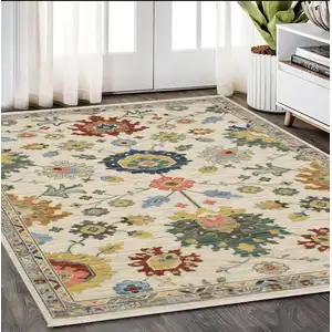 Photo of Ivory Blue And Yellow Oriental Area Rug With Fringe