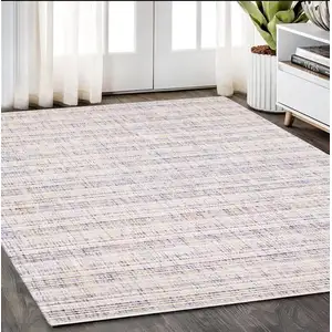 Photo of Ivory Blue And Yellow Striped Hand Tufted Area Rug