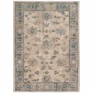 Photo of Ivory Blue Gold And Grey Oriental Power Loom Stain Resistant Area Rug