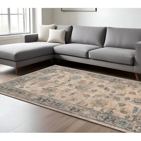 Ivory and Blue Oriental Power Loom Area Rug Photo 1