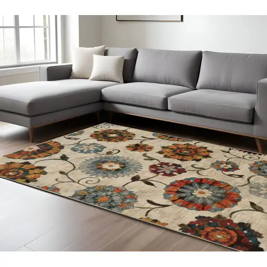 Ivory and Blue Floral Power Loom Area Rug Photo 1