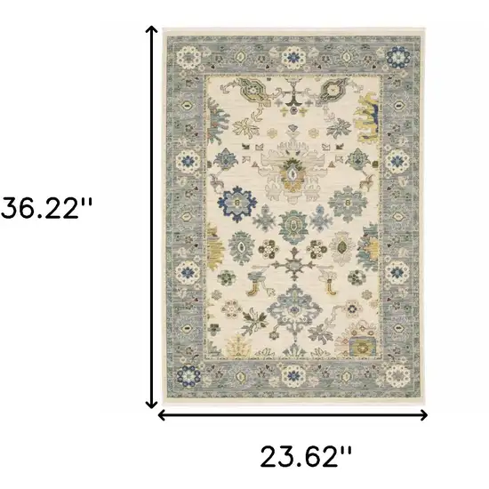 Ivory Blue Grey Teal Gold Green And Rust Oriental Power Loom Stain Resistant Area Rug With Fringe Photo 10