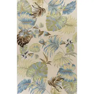 Photo of Ivory Blue Hand Tufted Tropical Leaves Indoor Area Rug