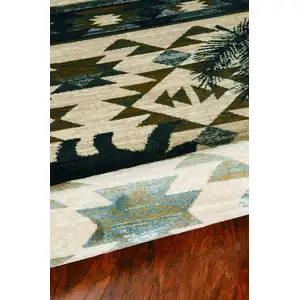 Photo of Ivory Blue Machine Woven Geometric Lodge Indoor Area Rug