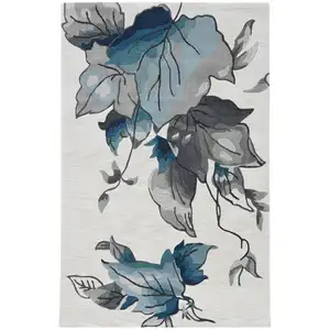 Photo of Ivory Blue Oversized Leaves Area Rug