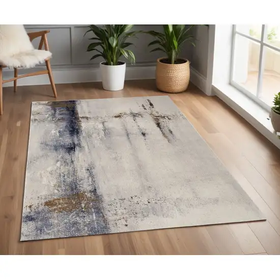 Ivory Blue and Brown Abstract Power Loom Area Rug Photo 1