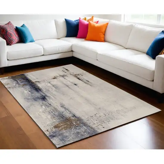 Ivory Blue and Brown Abstract Power Loom Area Rug Photo 1