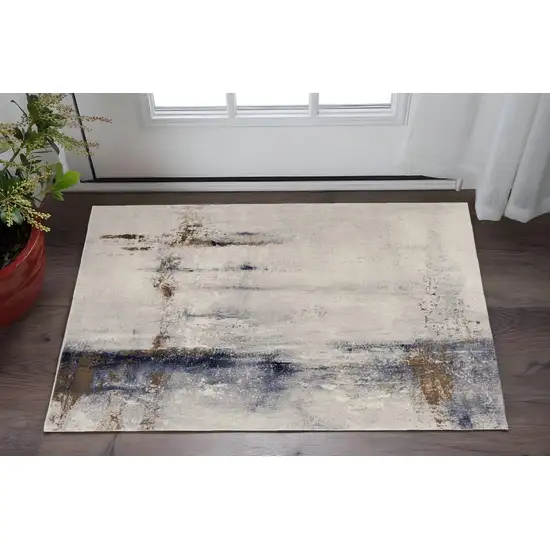 Ivory Blue and Brown Abstract Power Loom Area Rug Photo 1