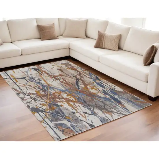 Ivory Blue and Brown Abstract Power Loom Area Rug Photo 1