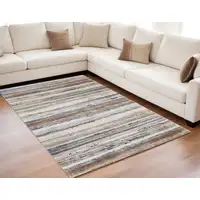 Photo of Ivory Blue and Brown Striped Power Loom Area Rug