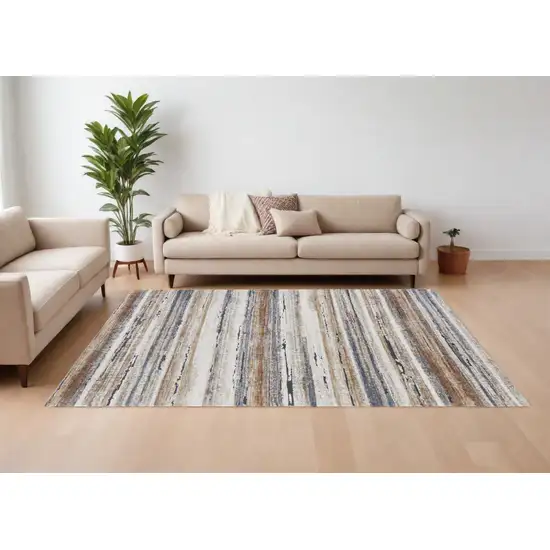 Ivory Blue and Brown Striped Power Loom Area Rug Photo 1