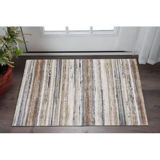 Ivory Blue and Brown Striped Power Loom Area Rug Photo 1