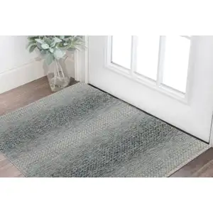 Photo of Ivory Blue and Brown Wool Hand Knotted Area Rug With Fringe