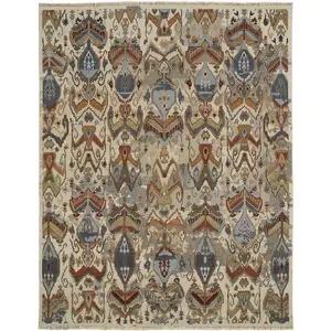 Photo of Ivory Blue and Brown Wool Ikat Hand Knotted Area Rug With Fringe