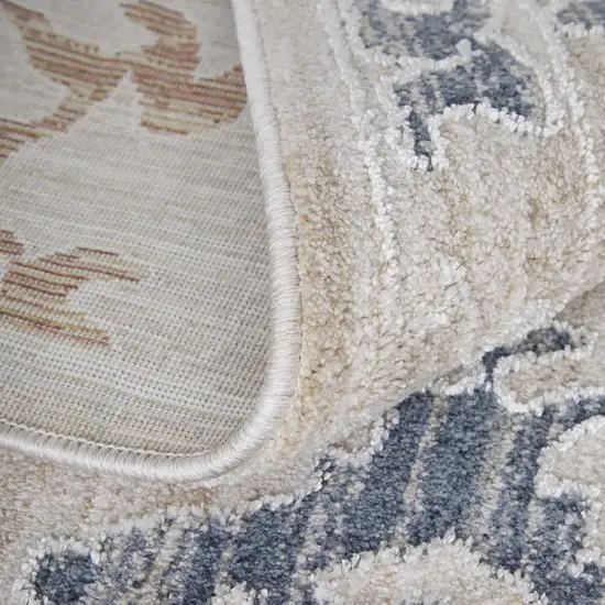 Ivory Blue and Gold Floral Power Loom Worn Faded Area Rug With Fringe Photo 9