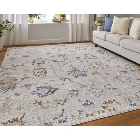 Ivory Blue and Gold Floral Power Loom Worn Faded Area Rug With Fringe Photo 9