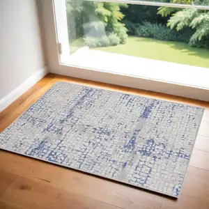 Photo of Ivory Blue and Gray Abstract Area Rug