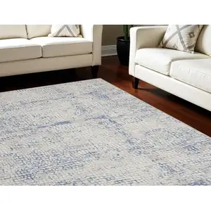 Photo of Ivory Blue and Gray Abstract Distressed Non Skid Area Rug