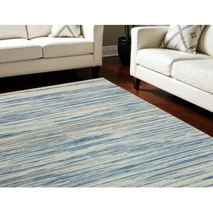 Photo of Ivory Blue and Gray Abstract Non Skid Area Rug