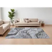 Photo of Ivory Blue and Gray Abstract Power Loom Area Rug