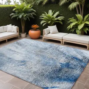 Photo of Ivory Blue and Gray Abstract Washable Non Skid Indoor Outdoor Area Rug