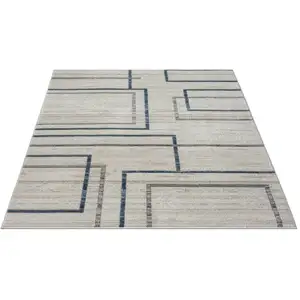 Photo of Ivory Blue and Gray Geometric Area Rug