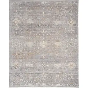 Photo of Ivory Blue and Gray Oriental Power Loom Distressed Area Rug With Fringe