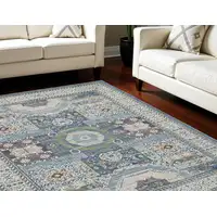 Photo of Ivory Blue and Green Oriental Distressed Non Skid Area Rug