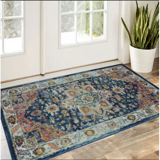 Ivory Blue and Orange Floral Distressed Non Skid Area Rug Photo 1