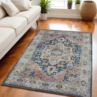 Photo of Ivory Blue and Orange Floral Medallion Distressed Non Skid Area Rug