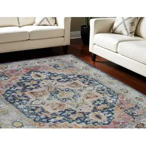 Photo of Ivory Blue and Orange Floral Medallion Distressed Non Skid Area Rug