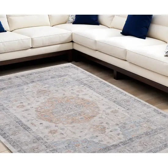 Ivory Blue and Orange Oriental Hand Woven Distressed Area Rug With Fringe Photo 1