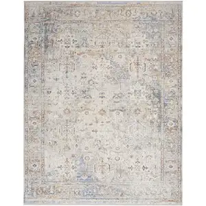 Photo of Ivory Blue and Orange Oriental Power Loom Distressed Area Rug With Fringe