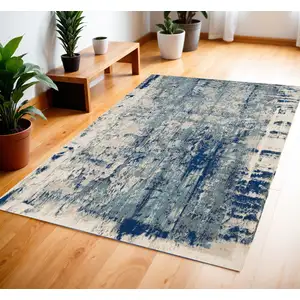 Photo of Ivory Blue and Slate Gray Abstract Area Rug