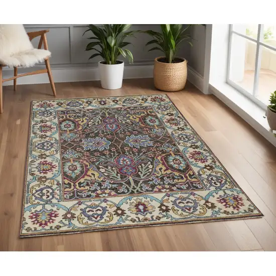 Ivory and Blue Wool Floral Hand Knotted Distressed Area Rug With Fringe Photo 1