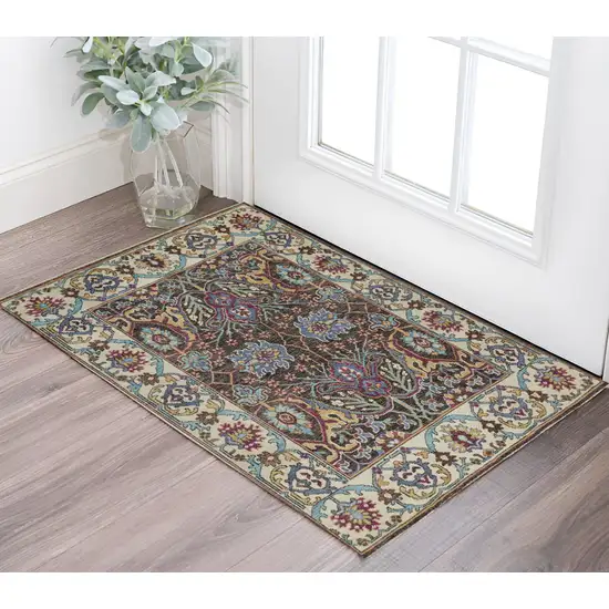 Ivory and Blue Wool Floral Hand Knotted Distressed Area Rug With Fringe Photo 1