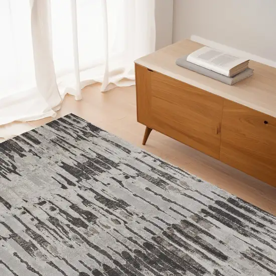 Gray and Ivory Abstract Power Loom Area Rug Photo 1