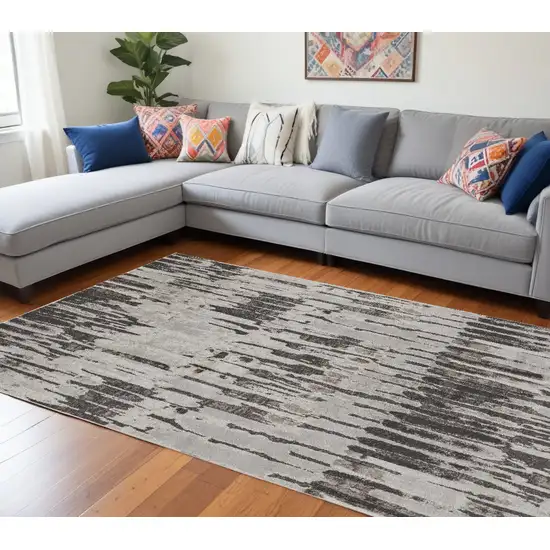 Gray and Ivory Abstract Power Loom Area Rug Photo 1