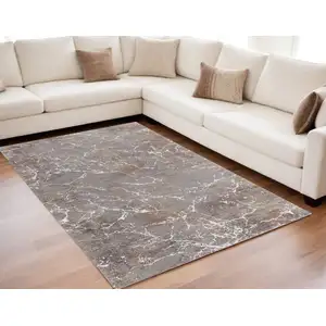 Photo of Ivory Brown and Taupe Abstract Power Loom Area Rug