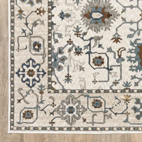 Ivory Burnt Orange And Blue Oriental Area Rug Photo 6