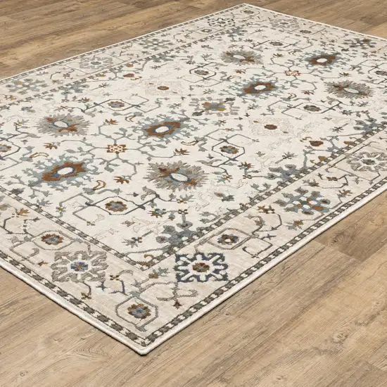 Ivory Burnt Orange And Blue Oriental Area Rug Photo 4