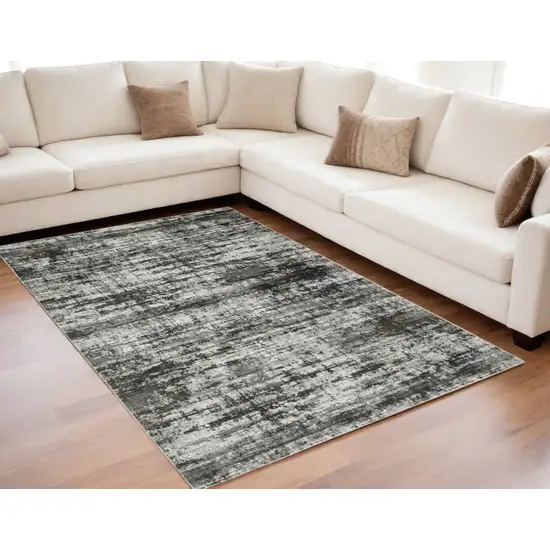 Ivory and Black Abstract Power Loom Area Rug Photo 1