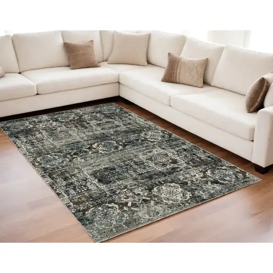 Ivory and Black Oriental Power Loom Area Rug Photo 1