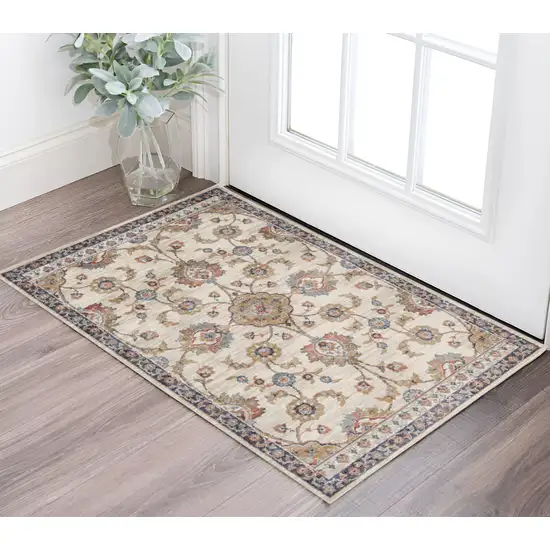 Ivory Navy and Orange Floral Power Loom Area Rug Photo 1