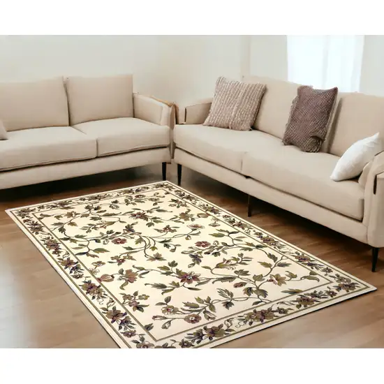 Ivory Floral Vine Bordered Area Rug Photo 1