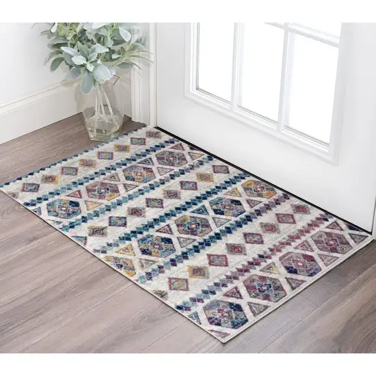 Ivory Blue and Orange Geometric Power Loom Area Rug Photo 1